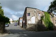 External view of a stone built workshop
