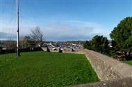 Low wall with flagpole and view
